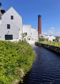 Metal art print of Lagavulin distillery, on Islay.