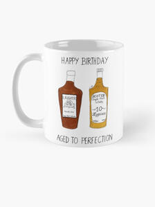 Ceramic coffee and tea mug featuring a celebratory watercolor whisky design, ideal birthday gift for scotch lovers.